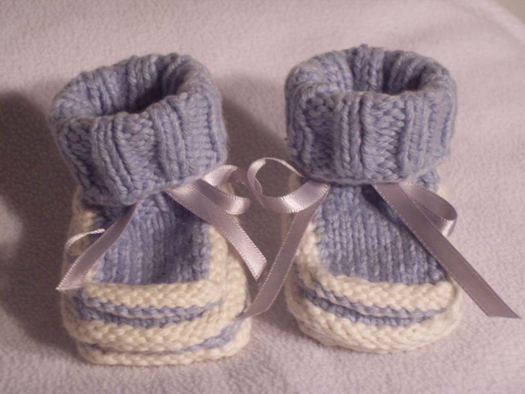 Colorful knitted baby booties